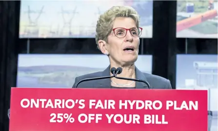  ?? ERNEST DOROSZUK/POSTMEDIA NETWORK ?? Ontario Premier Kathleen Wynne announced cuts to hydro rates on average of 25 per cent during a press conference in Toronto, in March.