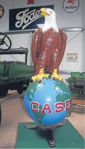  ??  ?? EAGLE HAS LANDED: A genuine cast Case eagle emblem from a former Case dealer in the States sits proudly in the Elderburn collection near St Andrews