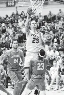  ?? Tom Reel / Staff photograph­er ?? After putting up just 8.7 ppg in the 12 games before the holidays, Nick Allen is averaging 14.6 points in the five games since.