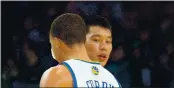  ?? DOUG DURAN — STAFF ?? The Warriors’ Stephen Curry (30) and Houston Rockets’ Jeremy Lin hug after a game in 2013.