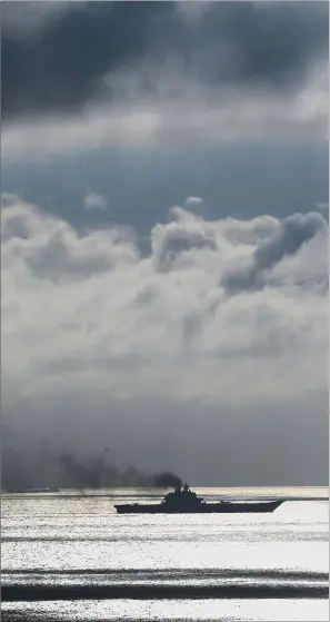  ?? PICTURE: PA ?? EN ROUTE: The Russian aircraft carrier Admiral Kuznetsov passes through the Strait of Dover.