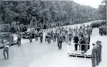 ?? SPECIAL TO THE EXAMINER ?? RCAF band on parade in London after the end of the Second World War, with Honourable Vincent Massey, Canadian High Commission­er, taking the salute on the platform at right.