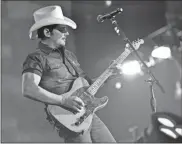  ??  ?? Brad Paisley says co-writing online keeps him focused and creative as he waits to see when touring might resume.