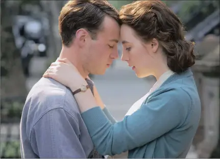 ?? Brooklyn. ?? POIGNANT: Emory Cohen and Saoirse Ronan in