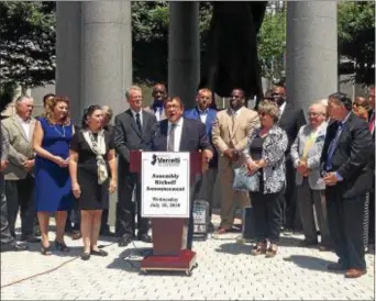  ?? SULAIMAN ABDUR-RAHMAN — THE TRENTONIAN ?? Mercer County Democratic bigwigs stand alongside Freeholder Anthony Verrelli (center) as he announces his candidacy for Trenton Mayor Reed Gusciora’s vacant New Jersey General Assembly seat.