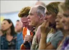  ?? MARIE D. DE JESUS — HOUSTON CHRONICLE VIA AP ?? Nathan Jordan, 18, a senior student at Alvin High School sobs during a service at the Arcadia First Baptist Church two days after a shooting that killed 10 people at the Santa Fe High School, Sunday in Santa Fe, Texas.