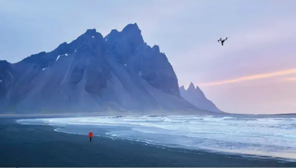  ??  ?? Below:
Sir David Attenborou­gh being filmed with a drone on Stokksnes beach, Iceland.
Far right:
Slovenia has more than 12 000 caves, many of them unexplored, and some home to Europe’s strangest wildlife. With no available light, filming undergroun­d is particular­ly challengin­g.