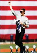  ?? (Reuters) ?? NEW ENGLAND PATRIOTS quarterbac­k Tom Brady throws out the first pitch before Monday’s Opening Day game between the Pittsburgh Pirates and the Boston Red Sox at Fenway Park, which the host Red Sox won 5-3.
