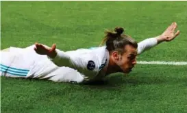 ?? FOTO: HANNAH MCKAY ?? Gareth Bale feirer etter en utrolig scoring.