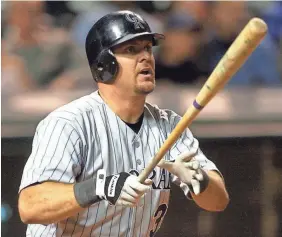  ?? TONY DEJAK/AP ?? Larry Walker is one of 19 players in baseball history in the exclusive 300/400/500 club.