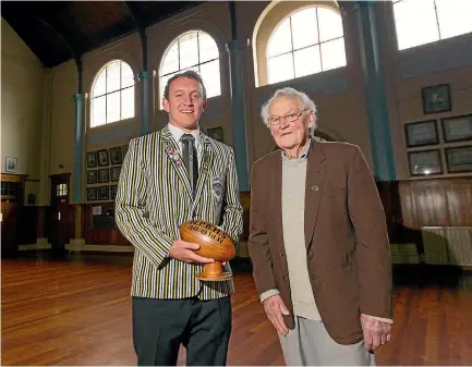  ?? PHOTO: SIMON O’CONNOR/STUFF ?? NPBHS first XV prop Corrigan Millar, left, with 1949 player Alan Luxton who organises his team’s annual reunion.