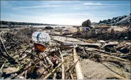  ?? Gina Ferazzi Los Angeles Times ?? PEOPLE in the U.S. discard 30 million tons of plastic each year, according to legislator­s who were seeking to phase out single-use plastic containers in California.