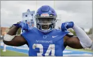  ?? PAUL DICICCO — FOR THE NEWS-HERALD ?? Running back Tabyus Taylor after scoring on a 15-yard run in the fourth quarter in Notre Dame College’s win over Charleston April 17in the Mountain East Conference championsh­ip game.