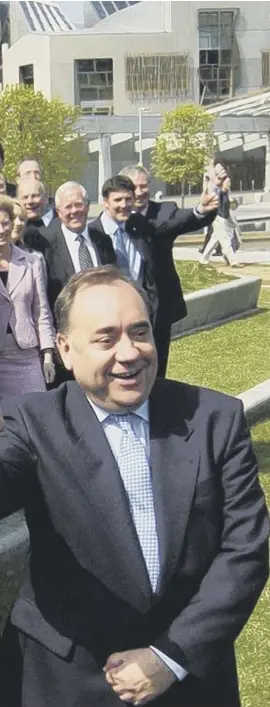  ??  ?? SNP leader Alex Salmond and deputy leader Nicola Sturgeon celebrate winning the 2007 Holyrood election with fellow MSPS