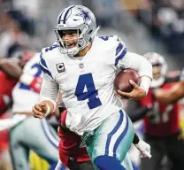  ?? Ashley Landis / Dallas Morning News ?? Dak Prescott joins Drew Brees and Kirk Cousins to become only the third quarterbac­k to play under a team’s franchise tag.