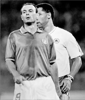 ??  ?? Paul McGrath during the quarter-final policing Italy’s Toto Schillaci, a man whose name is permanentl­y tattooed on his brain after scoring the decisive goal.