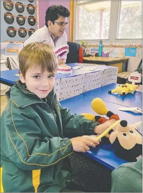  ?? PHOTO: DUBBO PHOTO NEWS. ?? Dubbo North Public School student Max Turnball practices his oral health on his Mickey Mouse teddy.
