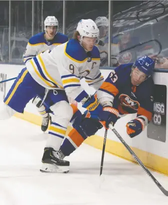  ?? BRUCE BENNETT/GETTY IMAGES/FILES ?? Sabres star Jack Eichel, seen crashing into Casey Cizikas of the Islanders, has had a miserable year. He had just two goals in 21 games before a neck injury ended his season .