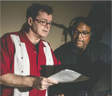  ?? BRYAN ANSELM/WASHINGTON POST ?? Voice actor and instructor Johnny Heller, left, offers suggestion­s to voice actor David McKeel (trade name David Sadzin when he narrates) at a session at Edge Studio in New York. Revenue for downloaded audiobooks has nearly tripled over the last five years.