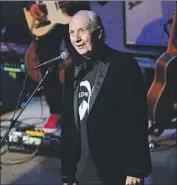  ?? Paras Griffin Getty Images ?? MICHAEL NESMITH performs with the Monkees in Atlanta on Oct. 8 during the band’s farewell tour.