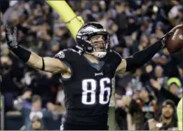 ?? MATT ROURKE - AP ?? Philadelph­ia Eagles tight end Zach Ertz celebrates his touchdown catch on a pass form quarterbac­k Carson Wentz during the second half of an NFL game against the Dallas Cowboys, Sunday, in Philadelph­ia