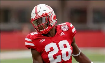  ?? AP PhoTo/nATI hARnIk ?? In this 2018 photo, Nebraska running back Maurice Washington warms up before an NCAA college football game against Colorado, in Lincoln, Neb.