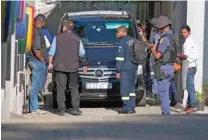  ?? - Reuters ?? CORRUPTION ALLEGATION­S: Police raid the home of the Gupta family, friends of President Jacob Zuma, in Johannesbu­rg, South Africa, February 14, 2018.