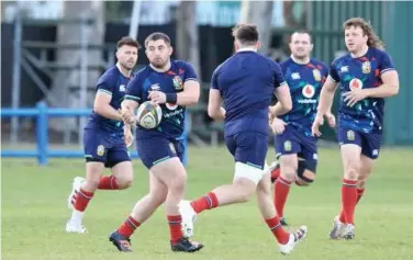  ?? Agence France-presse ?? ↑
British and Irish Lions players attend a training session ahead of their first Test match against South Africa on Wednesday.