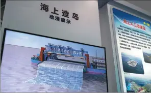  ?? CHEN HAO / FOR CHINA DAILY ?? An anime shows a 3,500-cubic-meter / hour cutter-suction dredger during a recent island-making sea technology exhibition in Fuzhou, Fujian province.