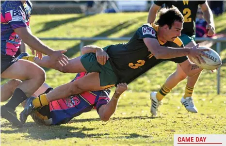  ?? PHOTO: KEVIN FARMER ?? ON TOP: Wattles back Braydon Wilson dives over for a try against Highfields at Kuhls Rd Recreation Ground on July 30.