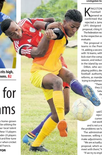  ?? FILE ?? Shaden Goslin (right) from Greenwich Town FC and Shakel Grant from Olympic Gardens fight for the ball during a KSAFA/Magnum Major League football match at the Tinson Pen Oval in St Andrew in 2018.