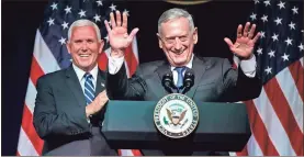  ?? / AP-Evan Vucci ?? Secretary of Defense Jim Mattis introduces Vice President Mike Pence during an event Thursday on the creation of a United States Space Force.