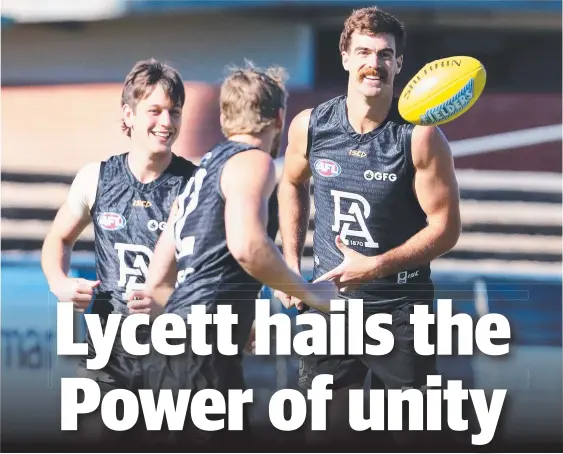  ?? Picture: SARAH REED ?? Port Adelaide ruckman Scott Lycett (right) trains with Zak Butters (left) and Trent McKenzie at Alberton Oval.