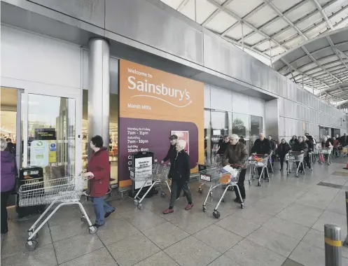  ?? ?? 0 Shoppers queue outside a branch of Sainsbury’s during the first lockdown in March 2020