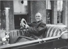  ?? AP FILE ?? New York Gov. Franklin D. Roosevelt is driven in the Packard Phaeton in Albany on Oct. 29, 1932.