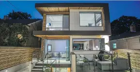  ?? SUPPLIED ?? CMGT Constructi­on Group’s ‘C’ House has a distinctiv­e modern architectu­ral style and is so named because the second level of the cube-shaped front face is shaped like the letter C.