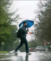  ?? JAY JANNER/AMERICANST­ATESMAN ?? Getting started on a regular walking regimen will have most people singing in the rain.
