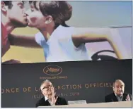  ?? (Photo AFP) ?? Thierry Frémaux (ici à gauche), et Pierre Lescure devant l’affiche du e Festival de Cannes, lors de la présentati­on de la sélection officielle.