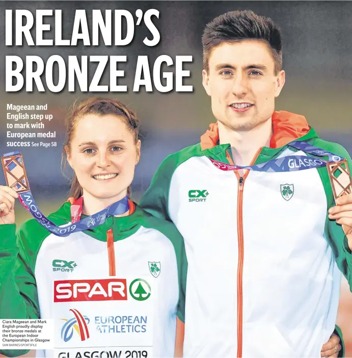  ?? SAM BARNES/SPORTSFILE ?? Ciara Mageean and Mark English proudly display their bronze medals at the European Indoor Championsh­ips in Glasgow