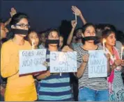  ?? PTI FILE ?? People take part in a protest against the rape of an eightyearo­ld girl in Madhya Pradesh’s Mandsaur.