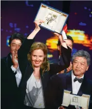  ?? Photo: Reuters ?? Justine Triet and Japanese director Hirokazu Kore-eda (right) at the closing ceremony of the 76th Cannes Film Festival.