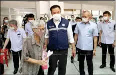  ?? Photo: Pattarapon­g Chatpattar­asill ?? Public Health Minister Anutin Charnvirak­ul meets elderly people at a temporary COVID-19 vaccinatio­n station in Nonthaburi on Mar 15.