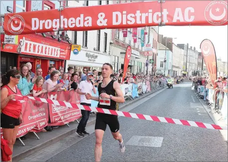  ??  ?? Darragh Greene wins the Drogheda 10k 2018.