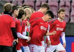  ??  ?? Denmark’s National team players wear shirts reading ‘Football supports change’ prior to the World Cup qualifier in group F between Denmark and Moldova last month (AP)