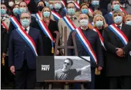  ??  ?? French lawmakers pay tribute to Paty.