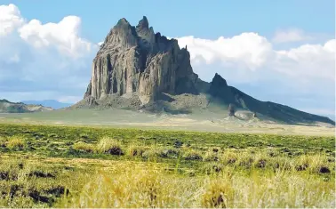  ?? MAJOR GRAHAM/FARMINGTON VISITORS AND CONVENTION BUREAU ?? Shiprock is almost synonymous with the Farmington area, where city officials are scrambling to keep the economy afloat as hundreds of jobs will disappear with the planned closure of the San Juan Generating Station.