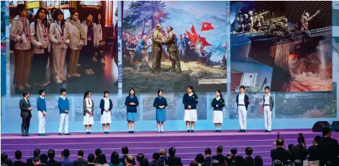  ?? Photos: Eugene Lee ?? Students share their experience­s of mainland study tours during the National Security Education Day event at the Hong Kong Convention and Exhibition Centre.