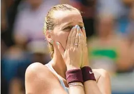  ?? EDUARDO MUNOZ ALVAREZ/AP ?? Petra Kvitova reacts after defeating Garbine Muguruza during the third round of the U.S. Open on Saturday in New York.