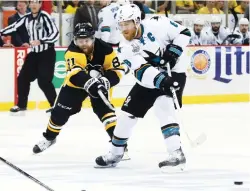  ?? (Reuters) ?? SAN JOSE SHARKS captain Joe Pavelski (right) and the Pittsburgh Penguins’ Phil Kessel (left) share little in common outside the fact they’re both from Wisconsin and were teammates on the US Olympic men’s hockey team. Kessel recorded two assists in...