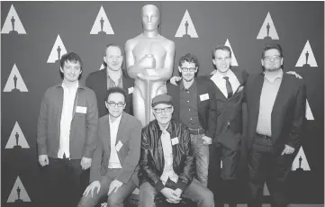  ??  ?? Nominees in the Short Film (Live Action) category pose together during a reception for the Academy Award nominated films in the Short Film (Animated) and Short Film (Live Action) categories at the Academy of Motion Picture Arts and Sciences in Beverly...